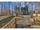 Spacious fenced backyard with a deck, patio, an above ground pool, and a storage shed at 306 Chinaberry Dr, China Grove, NC 28023