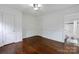 Bedroom has hardwood floors and ensuite bath at 4010 Hiddenbrook Dr, Charlotte, NC 28205