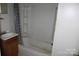 Modest bathroom with a single sink vanity and a combined tub and shower at 438 Pop Davis Rd, Taylorsville, NC 28681
