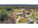 Aerial view of the property showcasing its vast land, neighboring homes, and lush green surroundings at 4783 Rainey Ln, Maiden, NC 28650