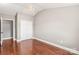 Hardwood floors and neutral walls add warmth to this bedroom at 4783 Rainey Ln, Maiden, NC 28650