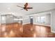 Open living room and kitchen area with hardwood floors and lots of natural light at 4783 Rainey Ln, Maiden, NC 28650