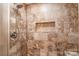 Shower stall features decorative tile, including a convenient storage niche at 4783 Rainey Ln, Maiden, NC 28650