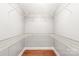 Bright walk-in closet providing ample storage with wrap around wire shelving at 4783 Rainey Ln, Maiden, NC 28650