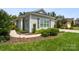 Beautiful single-story home featuring manicured landscaping and a curved sidewalk at 4922 Looking Glass Trl, Denver, NC 28037