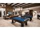 Spacious game room with pool tables, comfortable seating, and stylish decor at 4922 Looking Glass Trl, Denver, NC 28037
