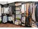 Spacious walk-in closet with ample storage, shelving, and hanging space for organizing clothes and accessories at 4922 Looking Glass Trl, Denver, NC 28037