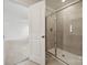 Sleek shower with tiled walls and glass door, adjacent to bedroom at 557 Mountain View Dr, Monroe, NC 28110