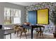 Bright dining room with modern decor, featuring a stylish table and chairs near a window at 7004 Matz Way, Charlotte, NC 28269