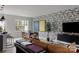 Open living and dining area featuring sleek furnishings and stylish accents throughout at 7004 Matz Way, Charlotte, NC 28269