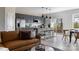 Inviting open living space featuring a stylish kitchen island and modern living room furniture at 7004 Matz Way, Charlotte, NC 28269