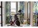 Bright exercise room with modern equipment, decorative curtains and a window view at 7004 Matz Way, Charlotte, NC 28269