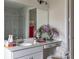 Elegant bathroom with marble shower, white vanity, large mirror, and stylish decor at 7008 Matz Way, Charlotte, NC 28269