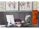 Close-up of modern glass desk and stylish decor with orchid in home office space at 7012 Matz Way, Charlotte, NC 28269