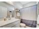 Bright bathroom with white vanity, shower and neutral wall color at 7348 Adirondack Dr, Denver, NC 28037