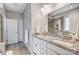 Bathroom with double vanity, granite counter, and a glass enclosed shower at 7348 Adirondack Dr, Denver, NC 28037
