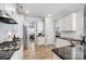Gourmet kitchen featuring stainless steel appliances, granite counters, and an eat-in area at 7348 Adirondack Dr, Denver, NC 28037