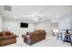 Spacious living room with plush sofas, flat screen TV, and bar seating at 7348 Adirondack Dr, Denver, NC 28037
