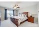 Inviting main bedroom with a ceiling fan, a window, and stylish furnishings at 7348 Adirondack Dr, Denver, NC 28037