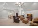 Spacious living room with a dining area, media space, and comfortable seating at 8724 Highgrove St, Charlotte, NC 28277