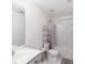 Well-lit bathroom features a single sink vanity, vanity mirror, and combined bathtub shower at 10114 Turkey Point Dr, Charlotte, NC 28214