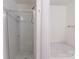 Bright bathroom featuring a tub, a shower with glass doors and a shower curtain at 10114 Turkey Point Dr, Charlotte, NC 28214