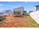 Backyard featuring a trampoline and partially fenced yard at 105 Abel Peterson Dr, Mount Holly, NC 28120
