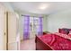 Bedroom featuring neutral walls, carpet and a window at 105 Abel Peterson Dr, Mount Holly, NC 28120