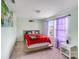 Bedroom featuring neutral walls, carpet, and a window at 105 Abel Peterson Dr, Mount Holly, NC 28120
