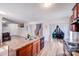 Bright kitchen features a center island with sink, modern appliances, and connects to a living area at 105 Abel Peterson Dr, Mount Holly, NC 28120