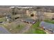 Aerial view of a single-Gathering home with long driveway and proximity to the lake at 107 Pinelake Dr, Kings Mountain, NC 28086