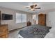 Comfortable bedroom features ceiling fan, window, and wood accents at 107 Pinelake Dr, Kings Mountain, NC 28086