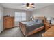 Cozy bedroom with a comfortable bed, soft carpet, and a dresser at 107 Pinelake Dr, Kings Mountain, NC 28086