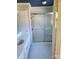 Bathroom with a white vanity and sink and a glass door walk-in shower at 10843 Caroline Acres Rd, Fort Mill, SC 29707