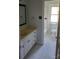 Bathroom with a white vanity, sink, and toilet and a walk-in shower at 10843 Caroline Acres Rd, Fort Mill, SC 29707