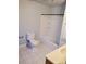 This bathroom offers a tub and shower combination with a classic white toilet at 10843 Caroline Acres Rd, Fort Mill, SC 29707
