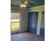 Bedroom features carpet, a ceiling fan, and blue built-in closets and trim at 10843 Caroline Acres Rd, Fort Mill, SC 29707
