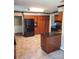 Traditional kitchen featuring wood cabinets and an island with black countertops at 10843 Caroline Acres Rd, Fort Mill, SC 29707
