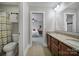 Bathroom featuring double sinks with granite countertop and tile flooring, and a view of a bedroom at 1122 Hartmann Ct, Fort Mill, SC 29715