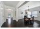 Dining room featuring a glass dining table with seating for six and dark hardwood flooring at 1122 Hartmann Ct, Fort Mill, SC 29715