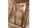 Bathroom featuring a tiled shower with glass enclosure and a modern shower head at 120 Ole Point Ln, Salisbury, NC 28146