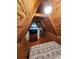 Unique wood-clad bedroom featuring a sloped ceiling and cozy decor at 120 Ole Point Ln, Salisbury, NC 28146