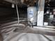Encapsulated crawlspace featuring a water tank and piping at 120 Ole Point Ln, Salisbury, NC 28146