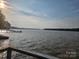 Scenic lake view from a dock with a clear sky backdrop, perfect for relaxation at 120 Ole Point Ln, Salisbury, NC 28146