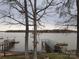 Scenic lake view showcasing docks and the tranquil waterfront at 120 Ole Point Ln, Salisbury, NC 28146