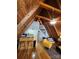 Inviting living area featuring wooden beams, kitchen access, and cozy seating arrangements at 120 Ole Point Ln, Salisbury, NC 28146