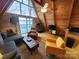 Bright and inviting living area with vaulted ceilings and large windows overlooking the lake at 120 Ole Point Ln, Salisbury, NC 28146