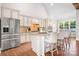 Well-lit kitchen with a large island and stainless steel appliances at 121 Dabbling Duck Cir, Mooresville, NC 28117