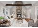 Inviting living space with a stone fireplace and exposed beams at 121 Dabbling Duck Cir, Mooresville, NC 28117