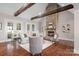 Cozy living room featuring a stone fireplace and comfortable seating at 121 Dabbling Duck Cir, Mooresville, NC 28117